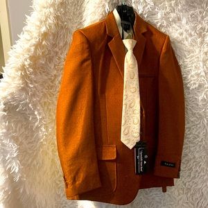 Brand new rust suit with matching shirt and tie, vest and pants with tag.